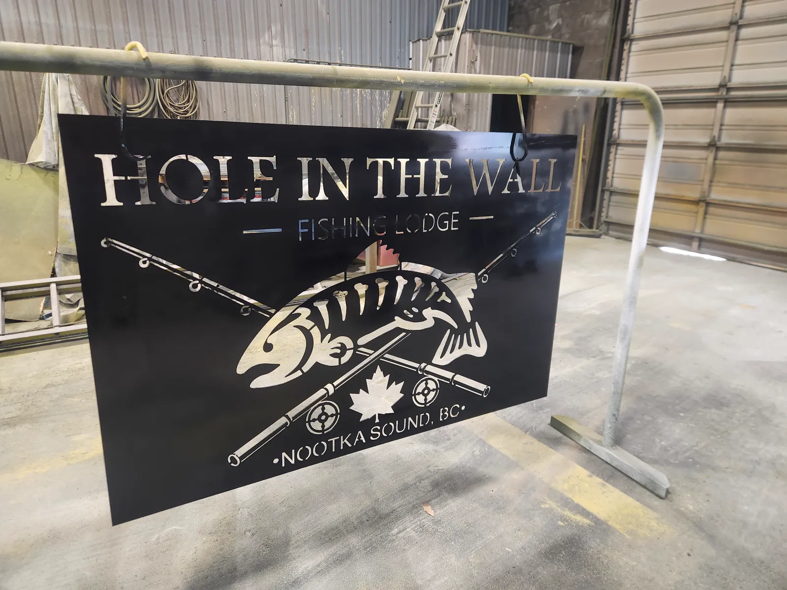 Finished laser-cut steel sign
