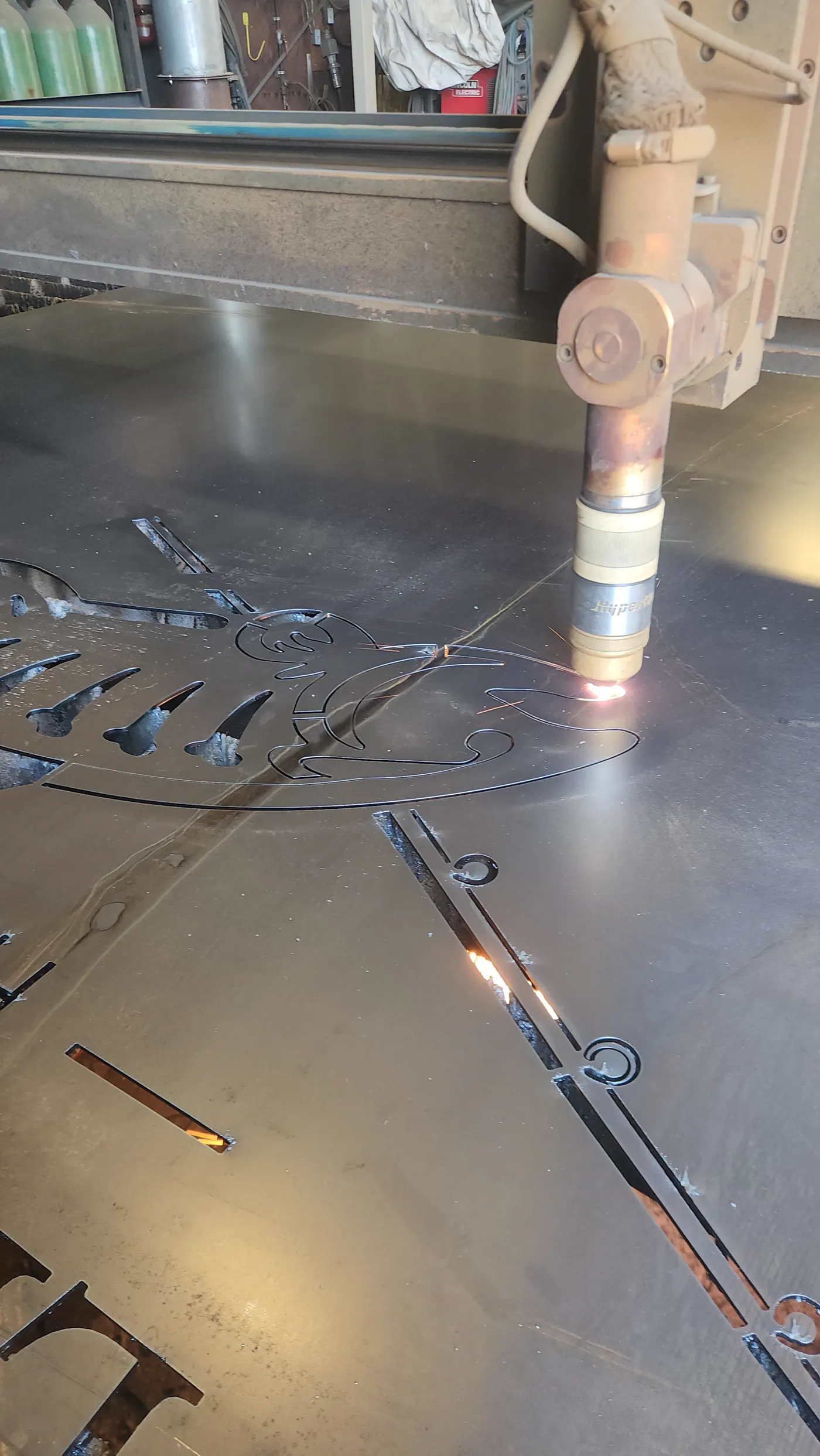 Laser table cutting a steel sign